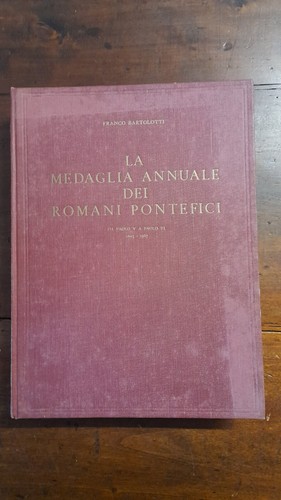 Libro sulla medaglia annuale - medaglia,